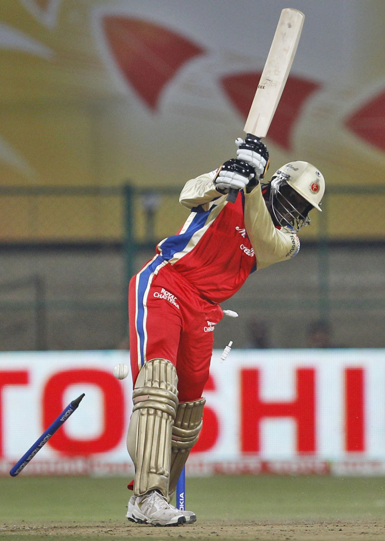 Chris Gayle has his stumps knocked out of the ground, Royal Challengers Bangalore v Kolkata Knight Riders, Champions League Twenty20, Bangalore, September 29, 2011