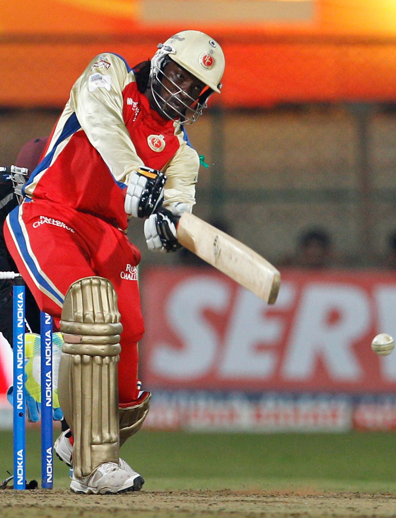 Chris Gayle drills one down the ground, Royal Challengers Bangalore v Somerset, Champions League Twenty20, Bangalore, October 3, 2011
