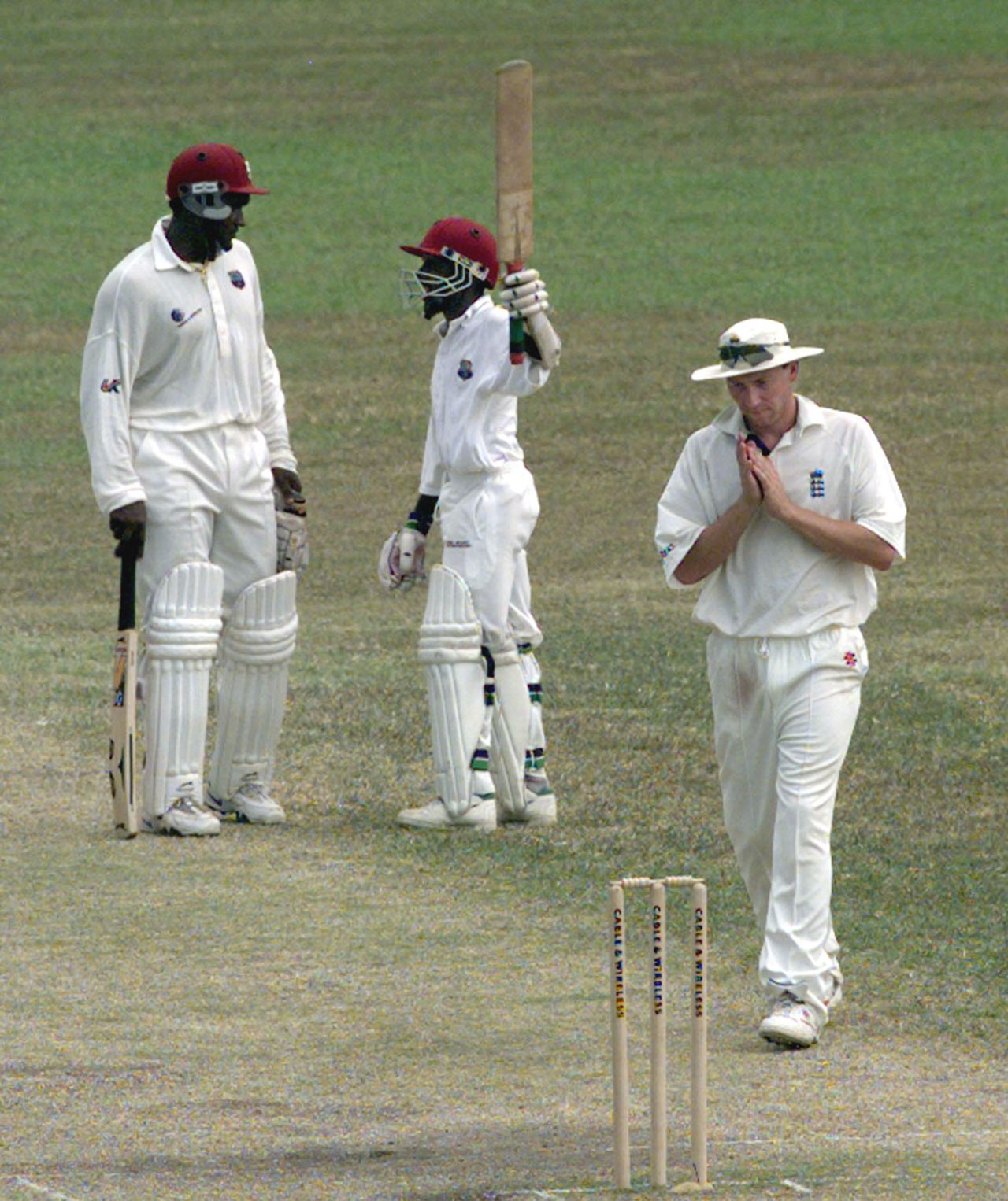 David Williams raises his bat after getting to a half-century, West Indies v England, 2nd Test, Port of Spain, 5th day, February 9, 1998