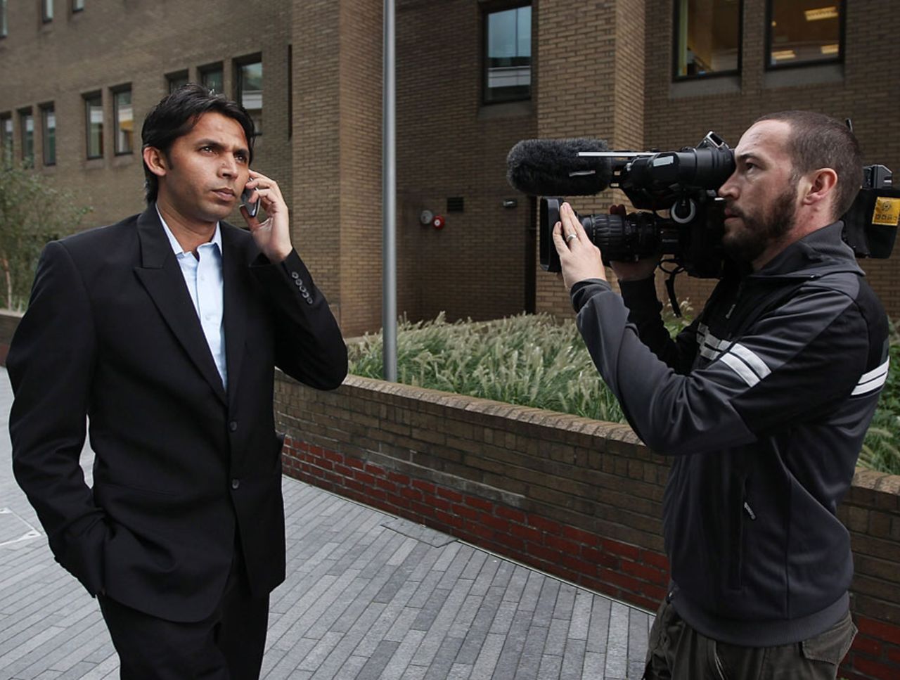 Mohammad Asif is filmed outside Southwark Crown Court, London, October 4, 2011
