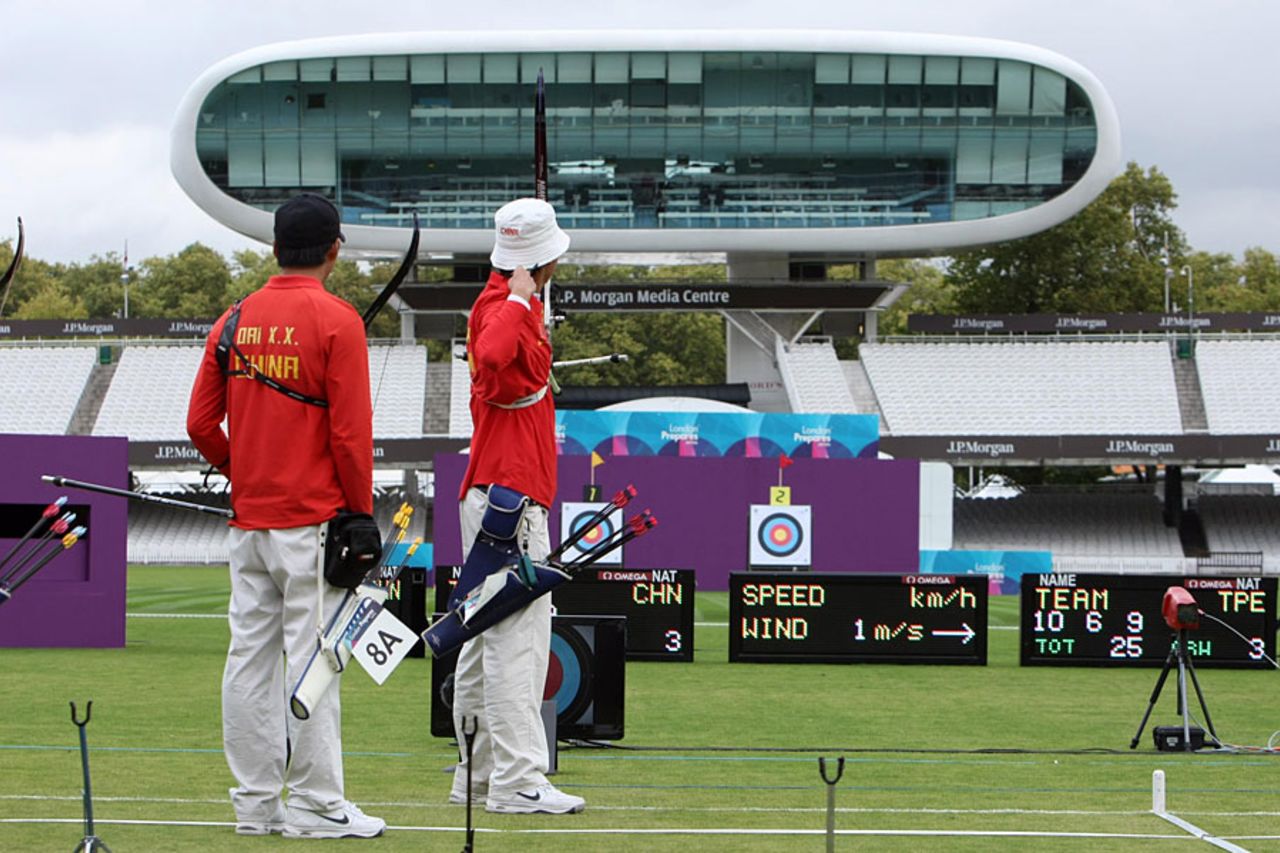 An archer takes aim towards the Lord's media centre, London, October 4, 2011
