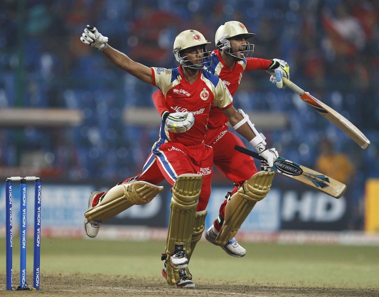 Arun Karthik and S Aravind celebrate after the last-ball six, Royal Challengers Bangalore v South Australia, Champions League T20, October 5, 2011