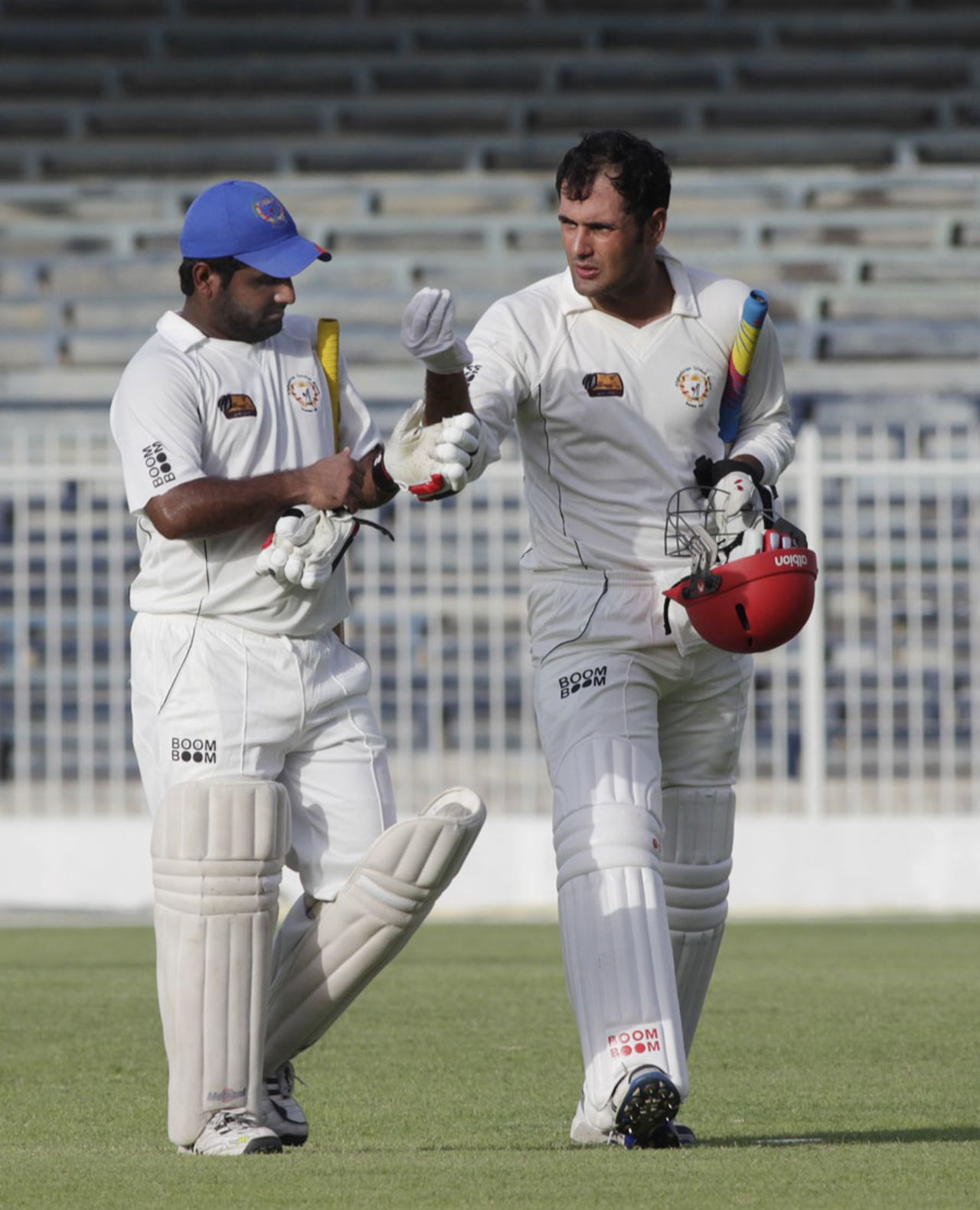 Mohammad Shahzad and Mohammad Nabi leave the field, UAE v Afghanistan, Intercontinental Cup, Sharjah, 2nd day, October 6 2011