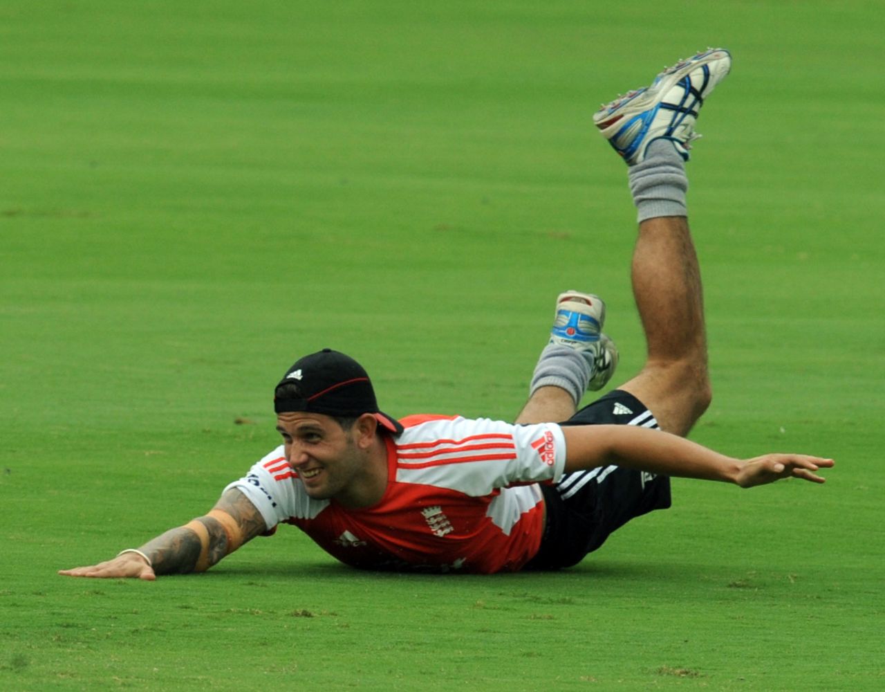 Jade Dernbach takes a tumble trying to field a ball, Hyderabad, October 7 2011