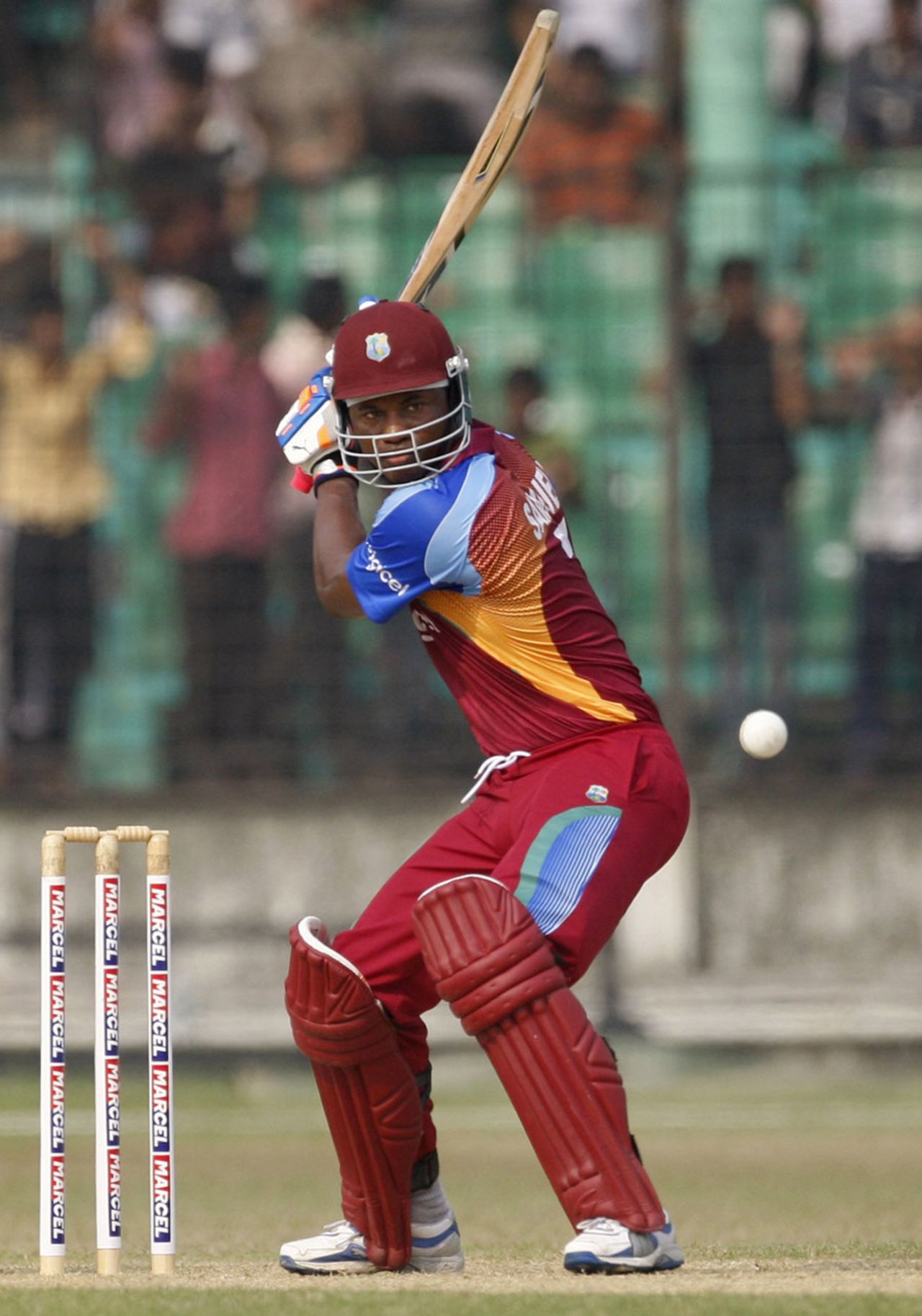 Marlon Samuels watches the ball closely, BCB XI v West Indians, Twenty20, Fatullah, October 9, 2011