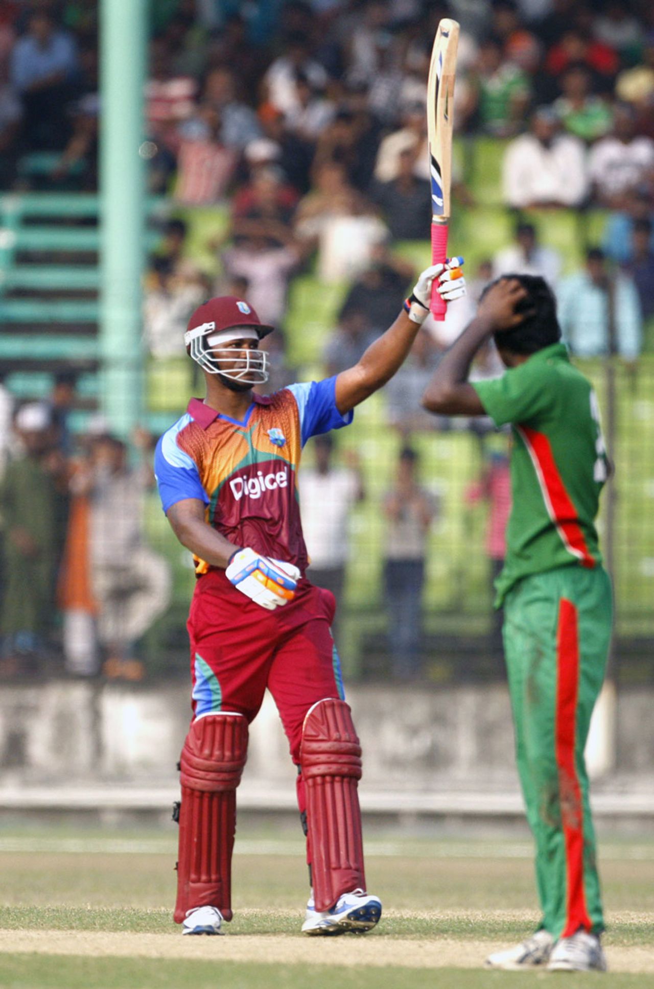 Marlon Samuels celebrates his century, BCB XI v West Indians, Twenty20, Fatullah, October 9, 2011