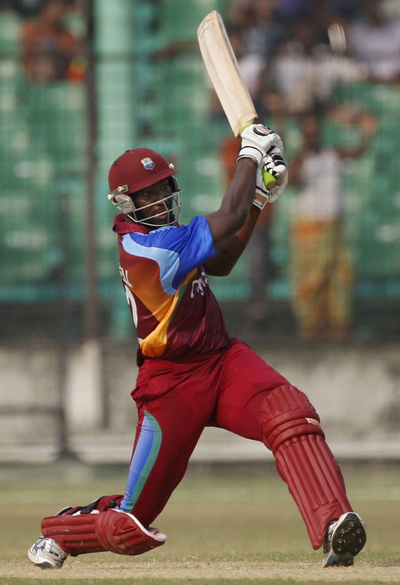 Andre Russell hits across the line during his 58, BCB XI v West Indians, Twenty20, Fatullah, October 9, 2011