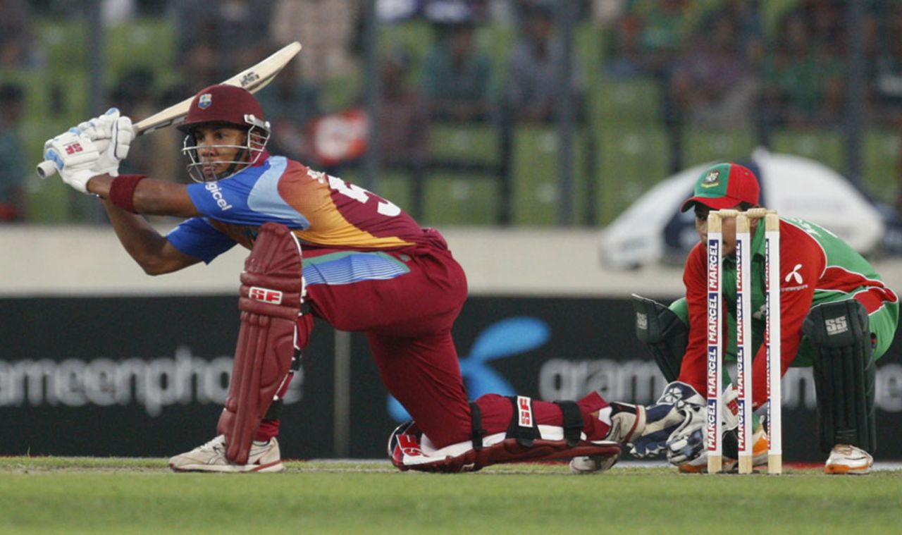 Lendl Simmons plays a sweep, Bangladesh v West Indies, only Twenty20, Mirpur, October 11, 2011