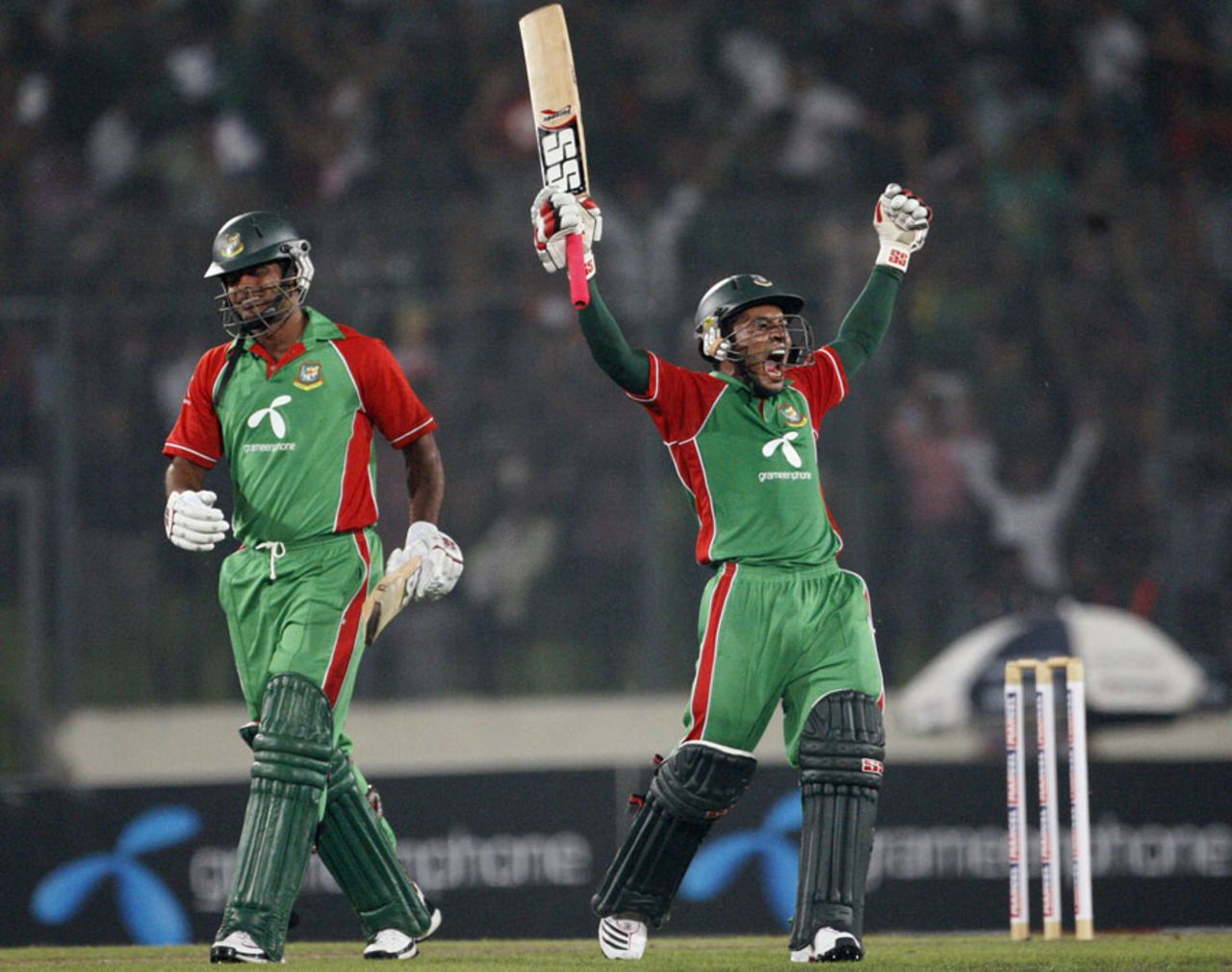 Mushfiqur Rahim and Abdur Razzak celebrate Bangladesh's win, Bangladesh v West Indies, only Twenty20, Mirpur, October 11, 2011