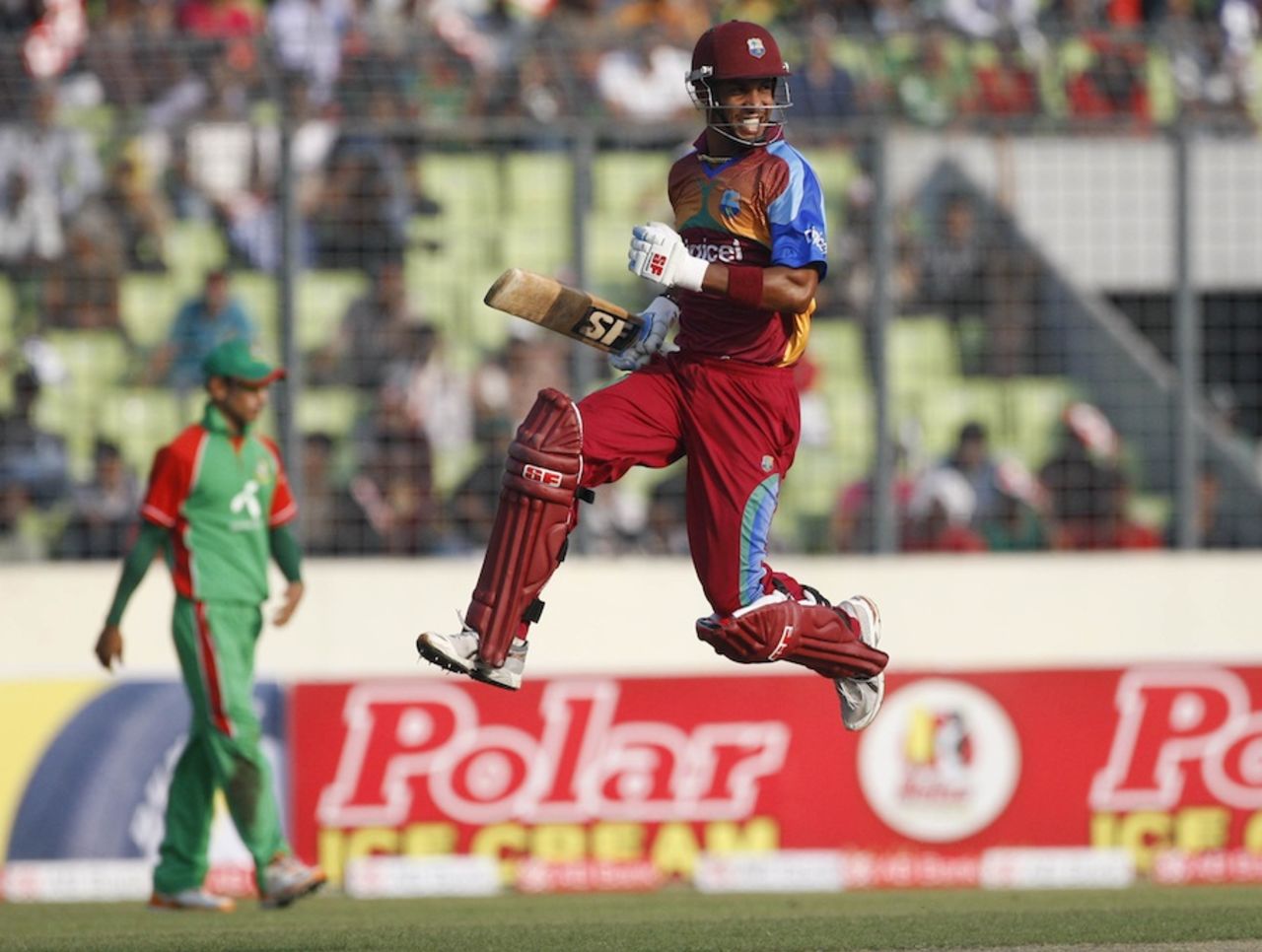 Lendl Simmons leaps in joy after scoring his maiden ODI century, Bangladesh v West Indies, 1st ODI, Mirpur, October 13, 2011