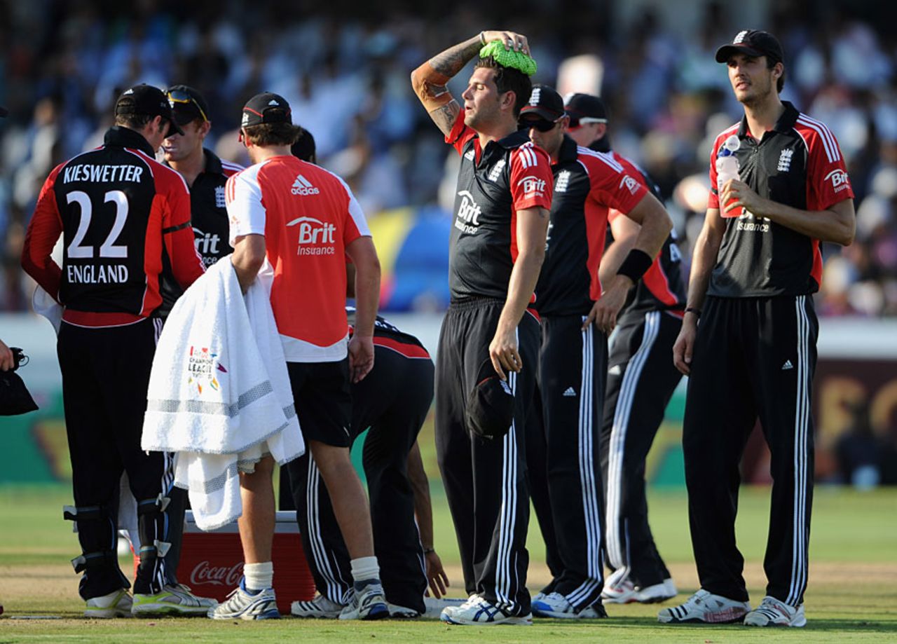 England's players try to cool off during a drinks interval, India v England, 1st ODI, Hyderabad, October 14, 2011