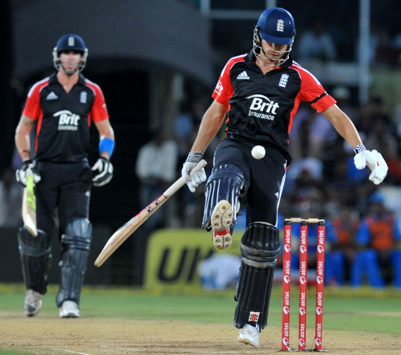 Alastair Cook kicks the ball away from his stumps, India v England, 1st ODI, Hyderabad, October 14, 2011