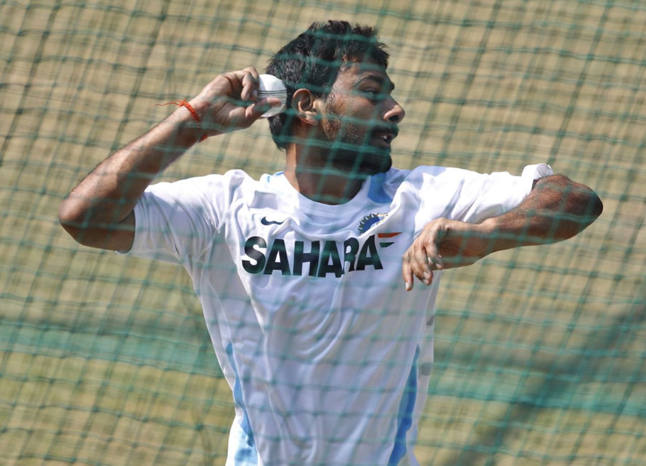 Praveen Kumar bowls during a training session, New Delhi, October 16, 2011