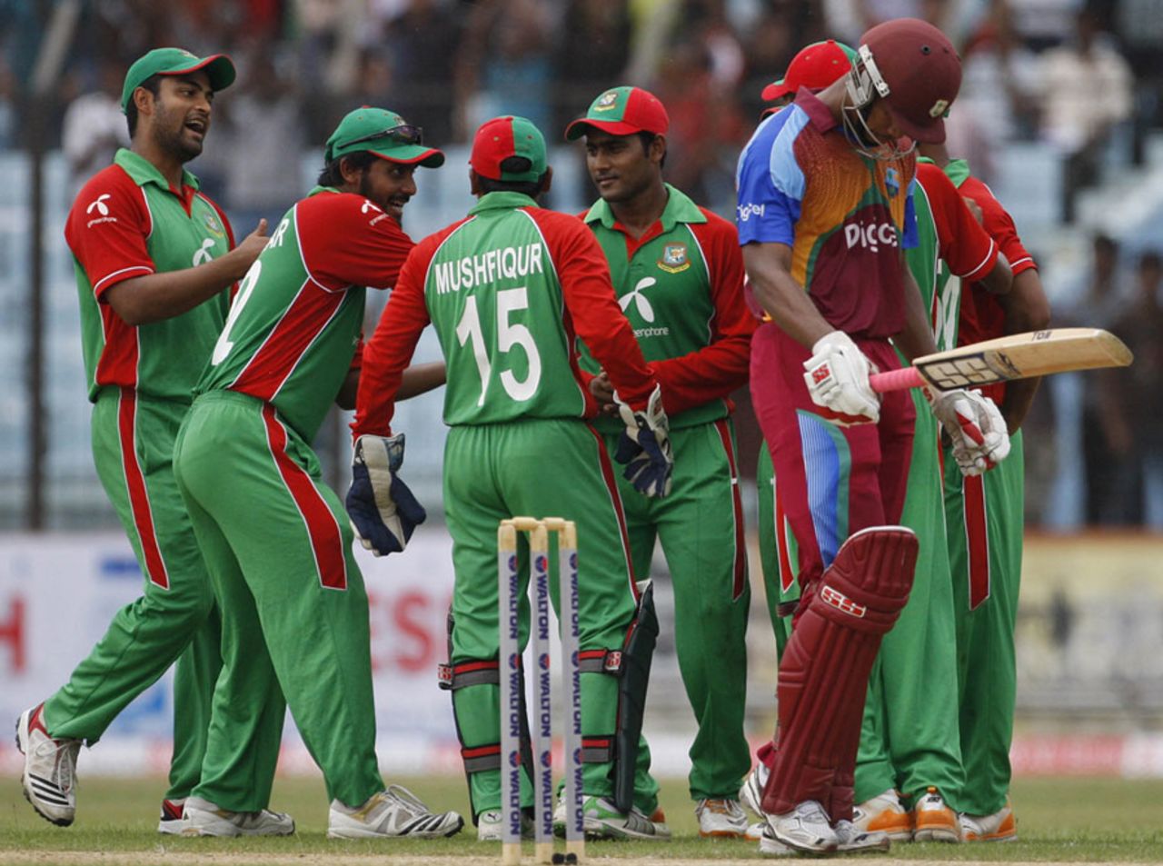 Bangladesh get together after claiming a wicket, Bangladesh v West Indies, 3rd ODI, Chittagong, October 18, 2011