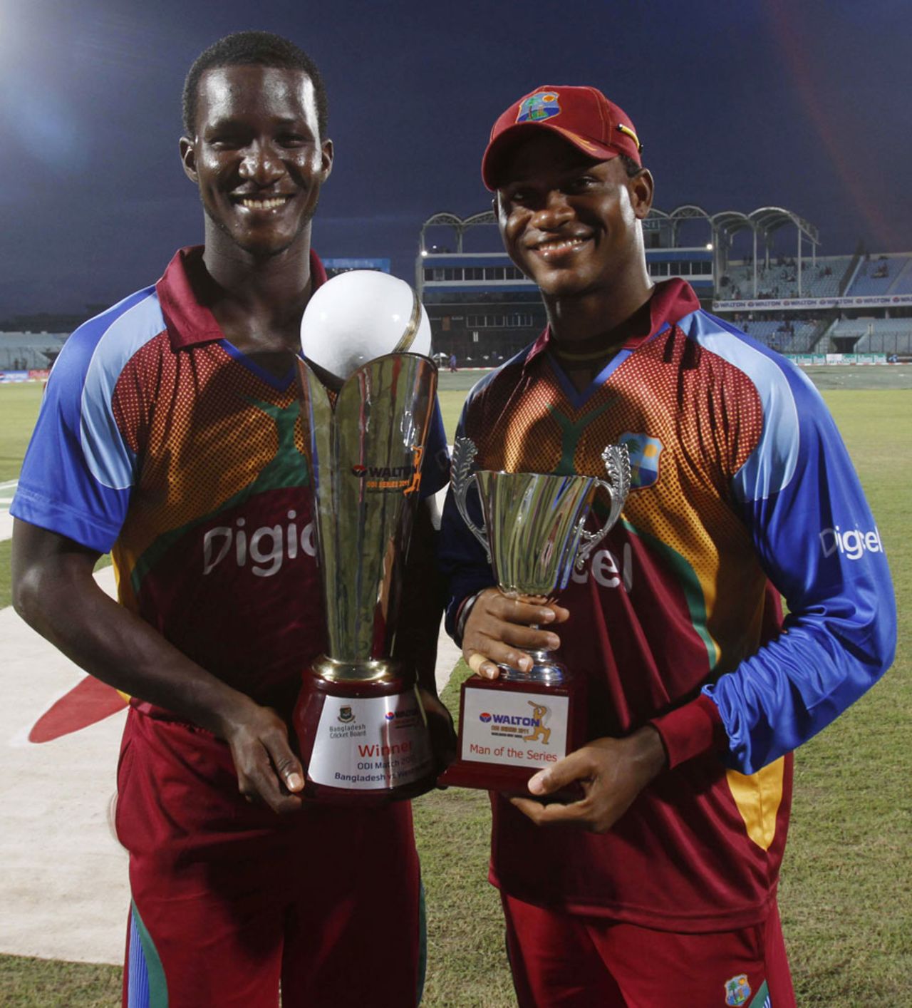 Player-of-the-Series Marlon Samuels with Darren Sammy and the winners' trophy, Bangladesh v West Indies, 3rd ODI, Chittagong, October 18, 2011