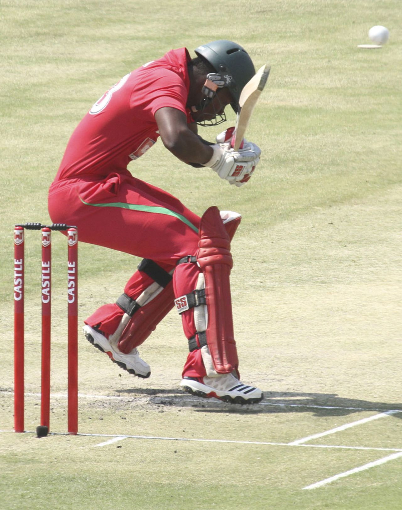 Chamu Chibhabha ducks under a bouncer, Zimbabwe v New Zealand, 1st ODI, Harare, October 20, 2011 