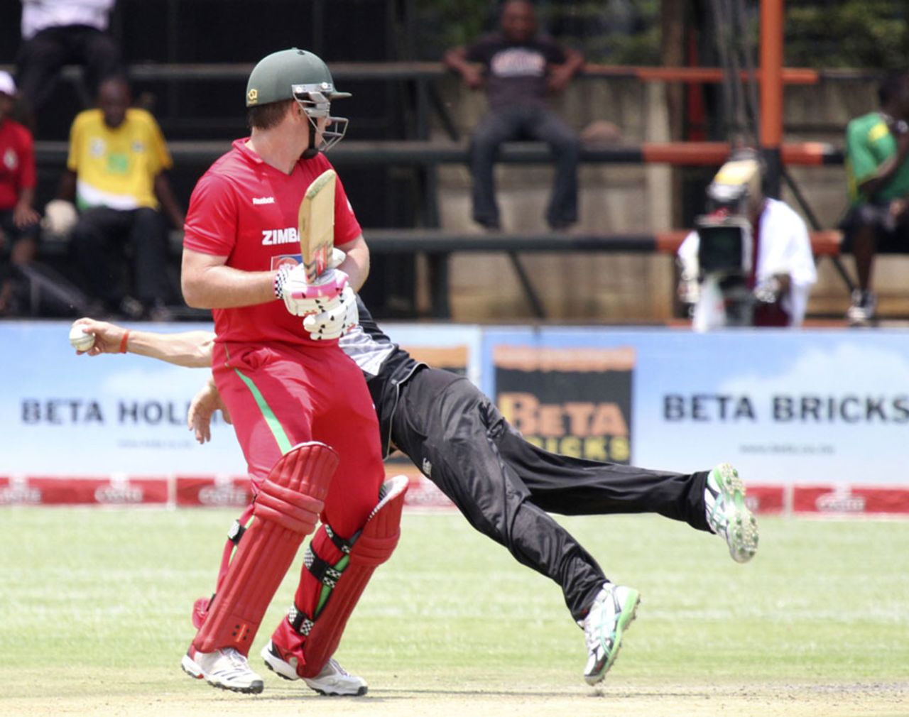 Brendan Taylor watches Nathan McCullum fly after the ball, Zimbabwe v New Zealand, 1st ODI, Harare, October 20, 2011 