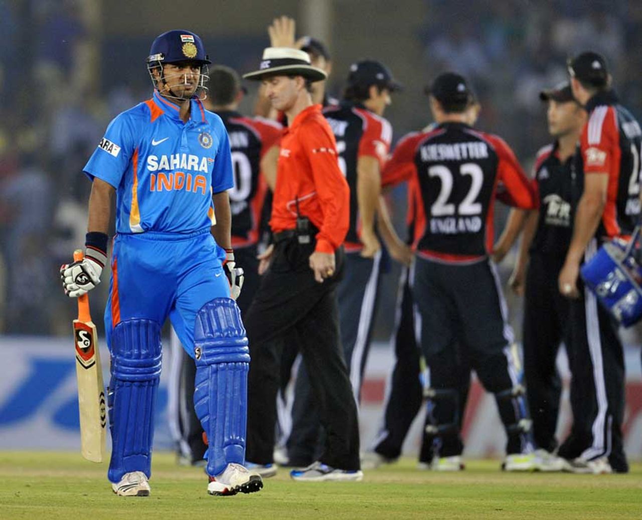 England celebrate as Suresh Raina departs, India v England, 3rd ODI, Mohali, October 20, 2011