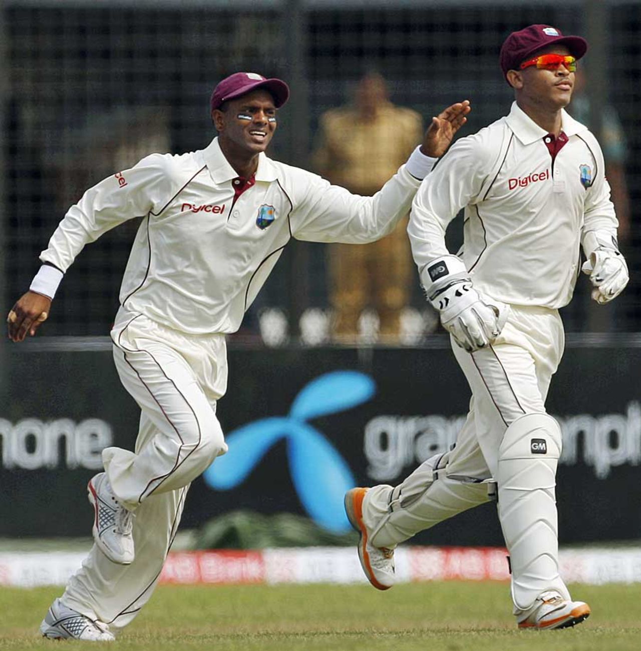 Shivnarine Chanderpaul and Carlton Baugh celebrate Imrul Kayes' wicket, Bangladesh v West Indies, 1st Test, Chittagong, 1st day, October 21, 2011