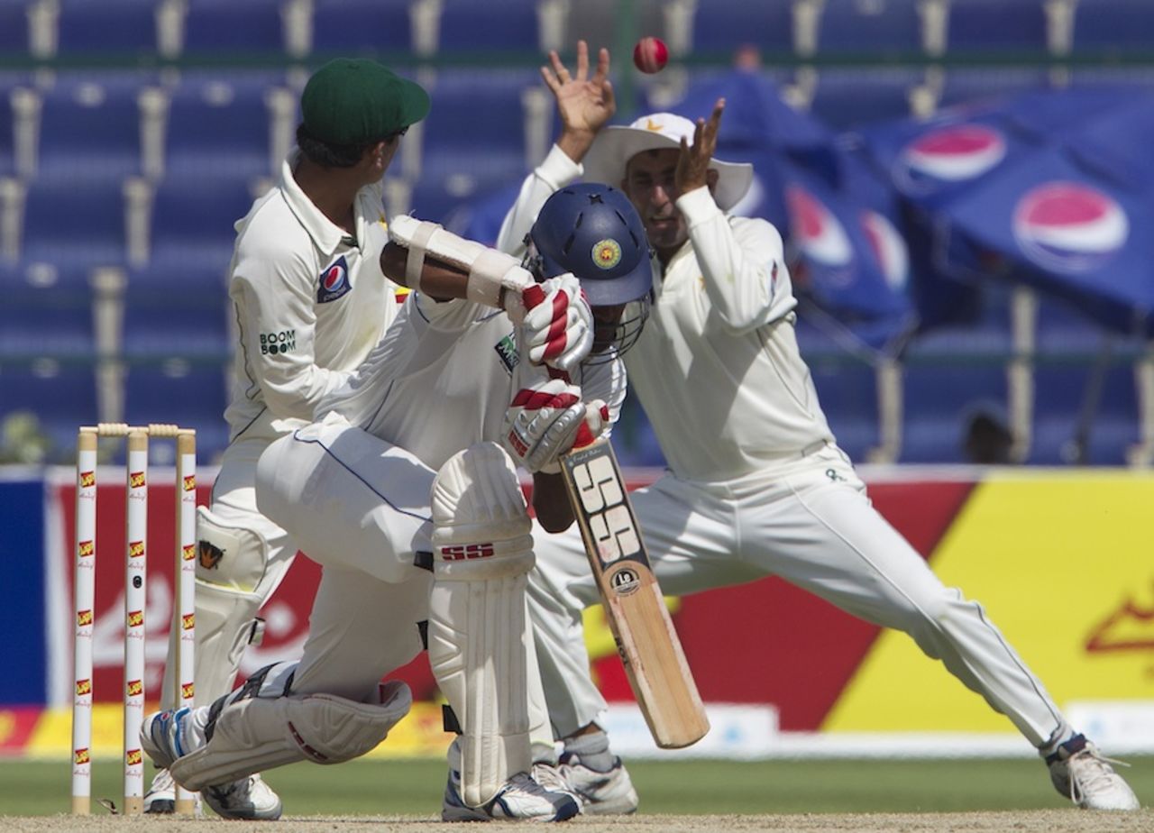 Younis Khan attempts to field at slip off Lahiru Thirimanne, Pakistan v Sri Lanka, 1st Test, Abu Dhabi, 4th day, October 21, 2011