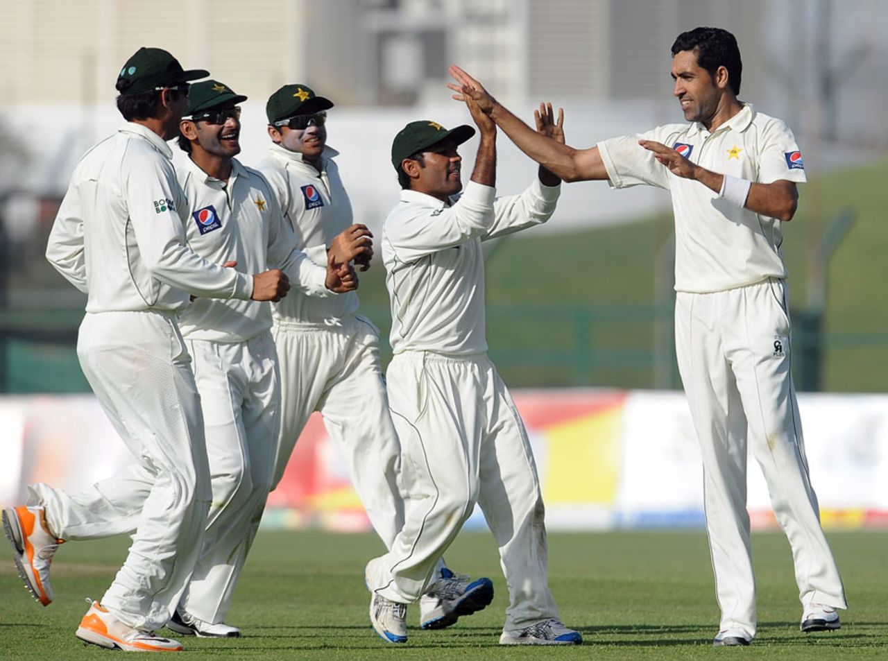 Pakistan get together after Umar Gul's dismissal of Angelo Mathews, Pakistan v Sri Lanka, 1st Test, Abu Dhabi, 4th day, October 21, 2011