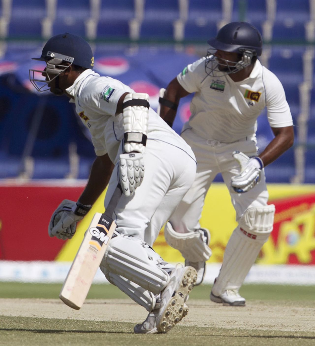Kumar Sangakkara and Prasanna Jayawardene run between the wickets, Pakistan v Sri Lanka, 1st Test, Abu Dhabi, 5th day, October 22, 2011