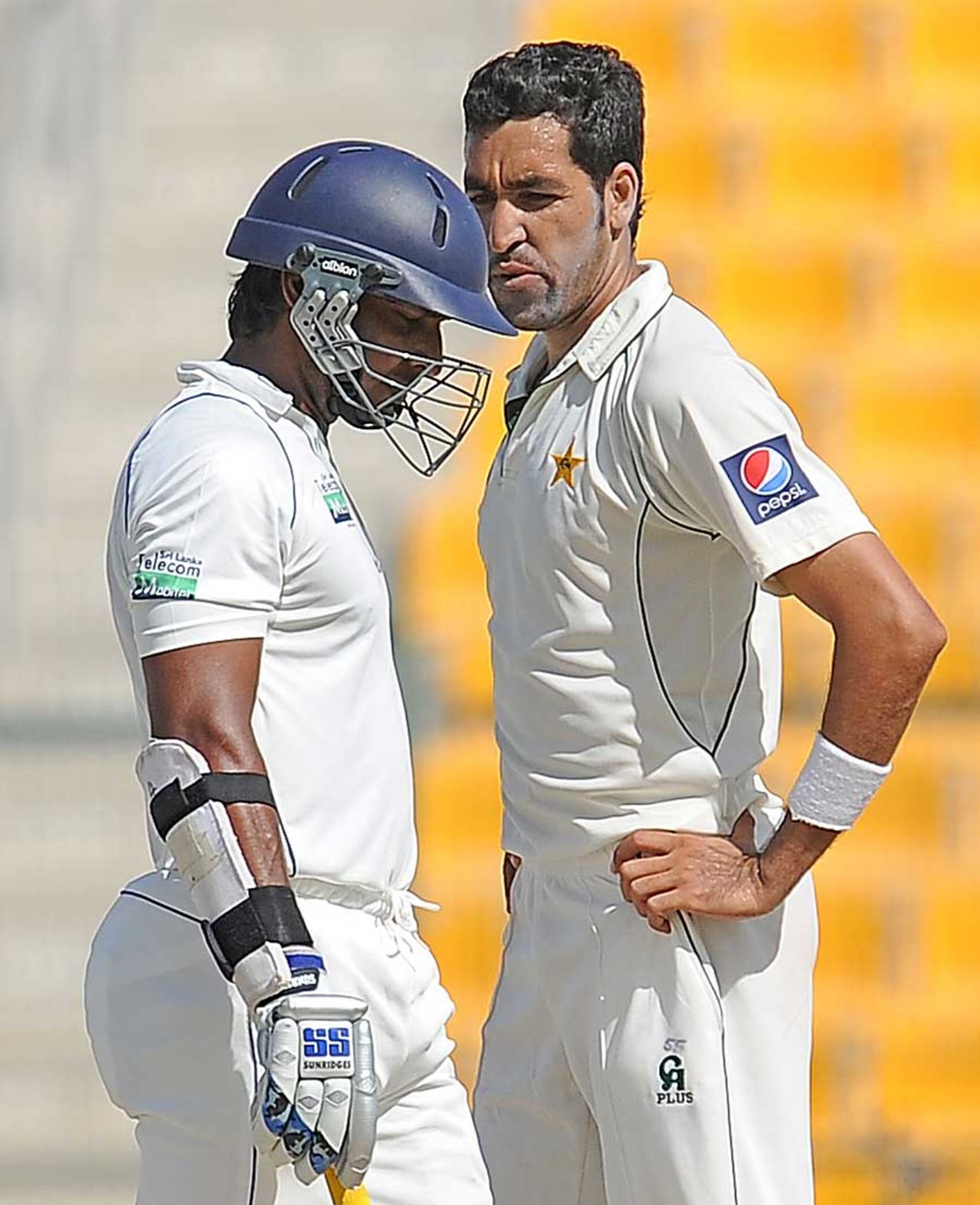 A frustrated Umar Gul can't help but stare at Kumar Sangakkara, Pakistan v Sri Lanka, 1st Test, Abu Dhabi, 5th day, October 22, 2011