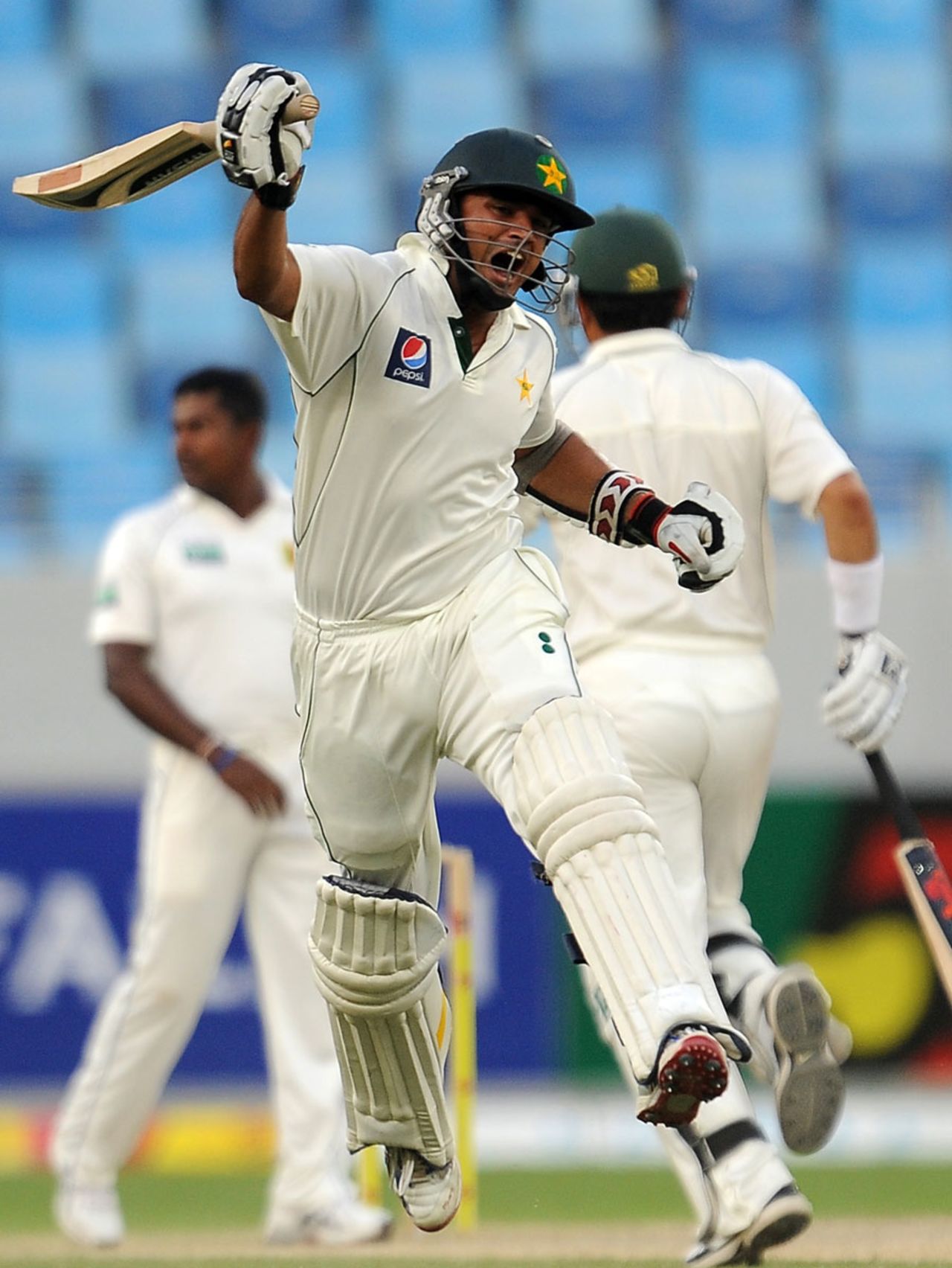Azhar Ali is pumped up after completing his maiden Test century, Pakistan v Sri Lanka, 2nd Test, Dubai, 2nd day, October 27, 2011