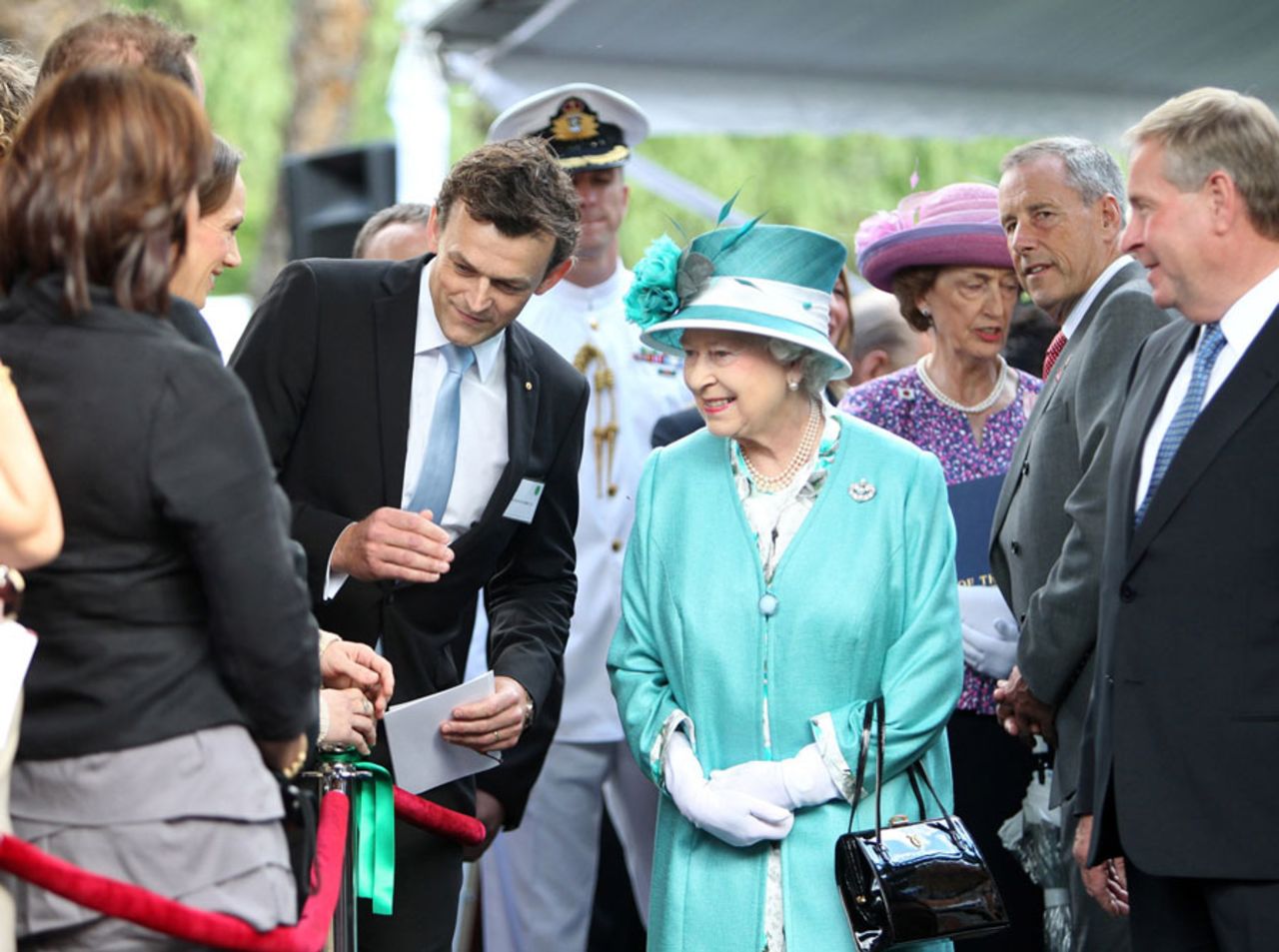 Adam Gilchrist and Queen Elizabeth have a chat during a state reception in Perth, October 27, 2011