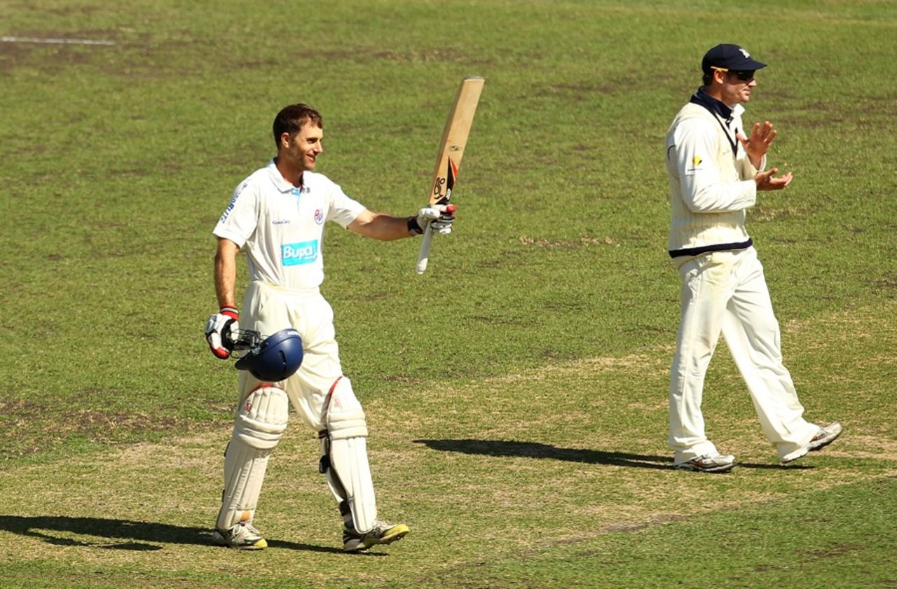 Simon Katich salutes his century as David Hussey applauds, New South Wales v Victoria, Sheffield Shield, day four, Sydney, October 28 2011