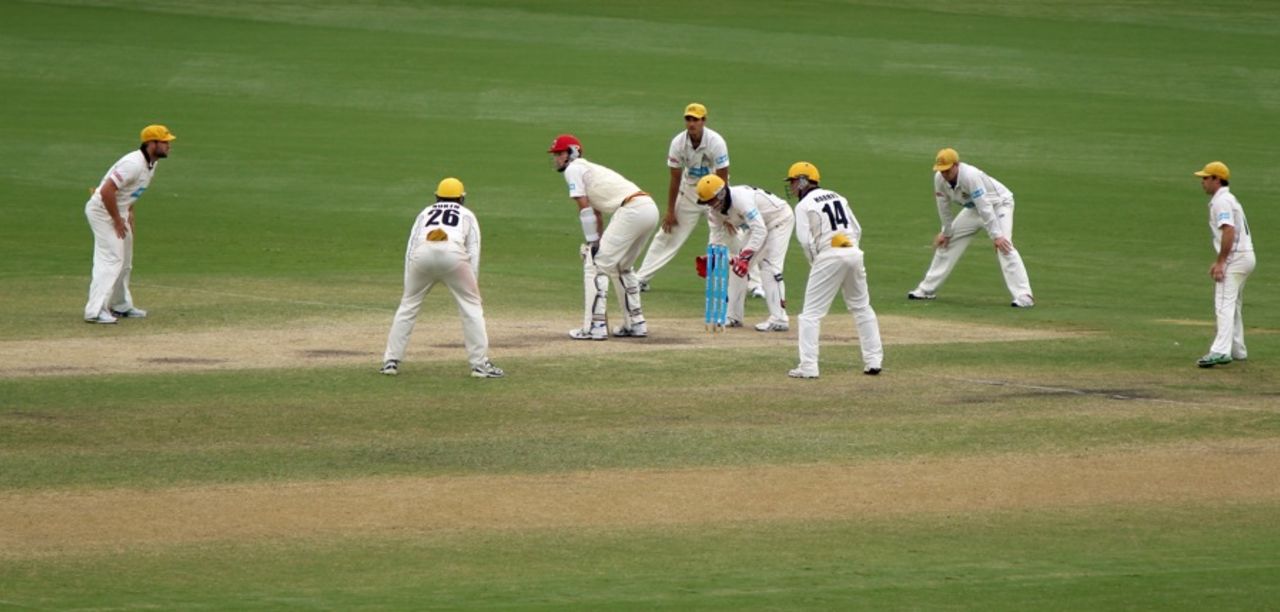No. 11 Peter George surrounded by fielders, South Australia v Western Australia, Sheffield Shield, day four, Adelaide, October 28 2011