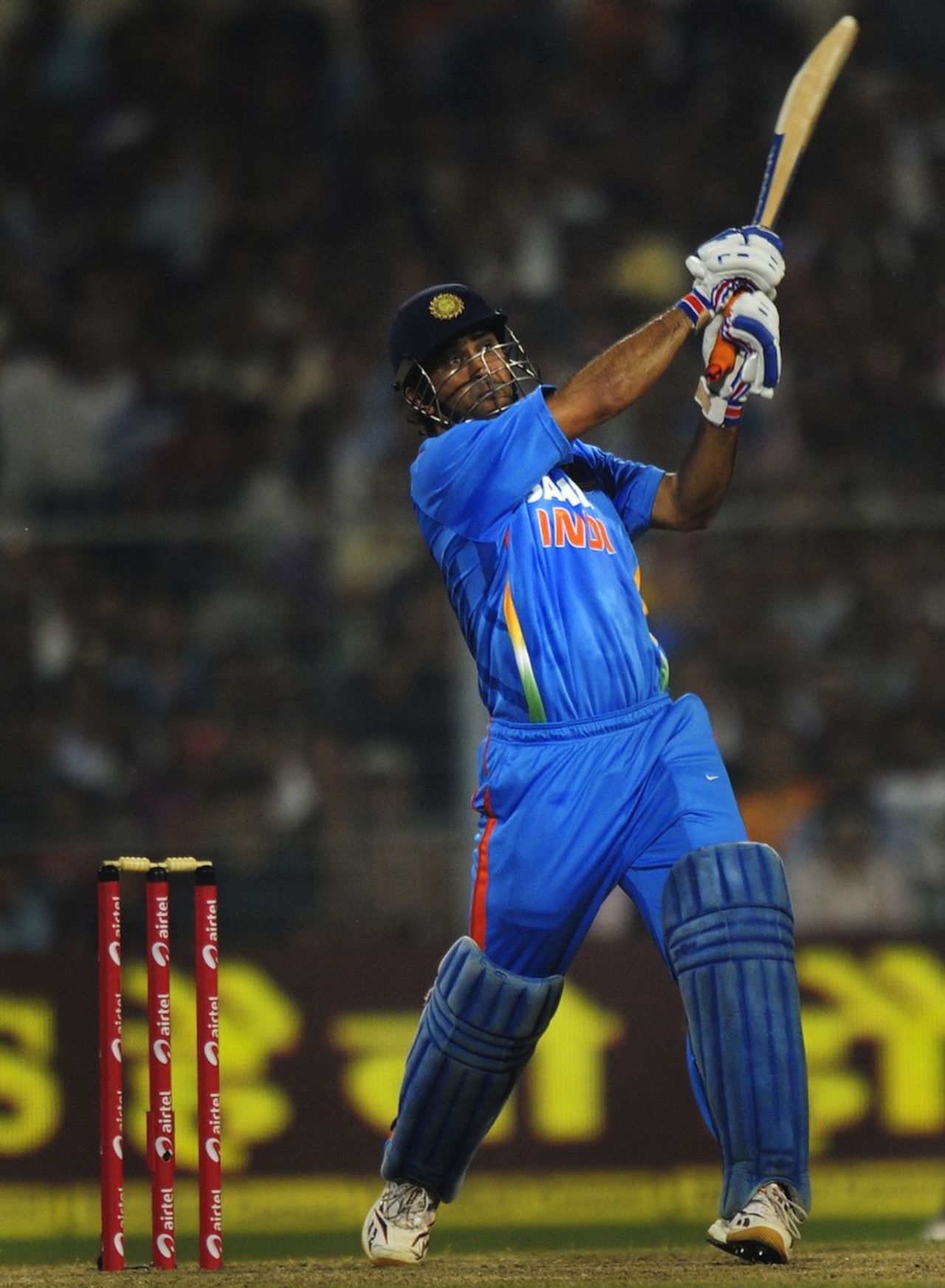 MS Dhoni hits down the ground, India v England, Only Twenty20, Eden Gardens, October 29, 2011