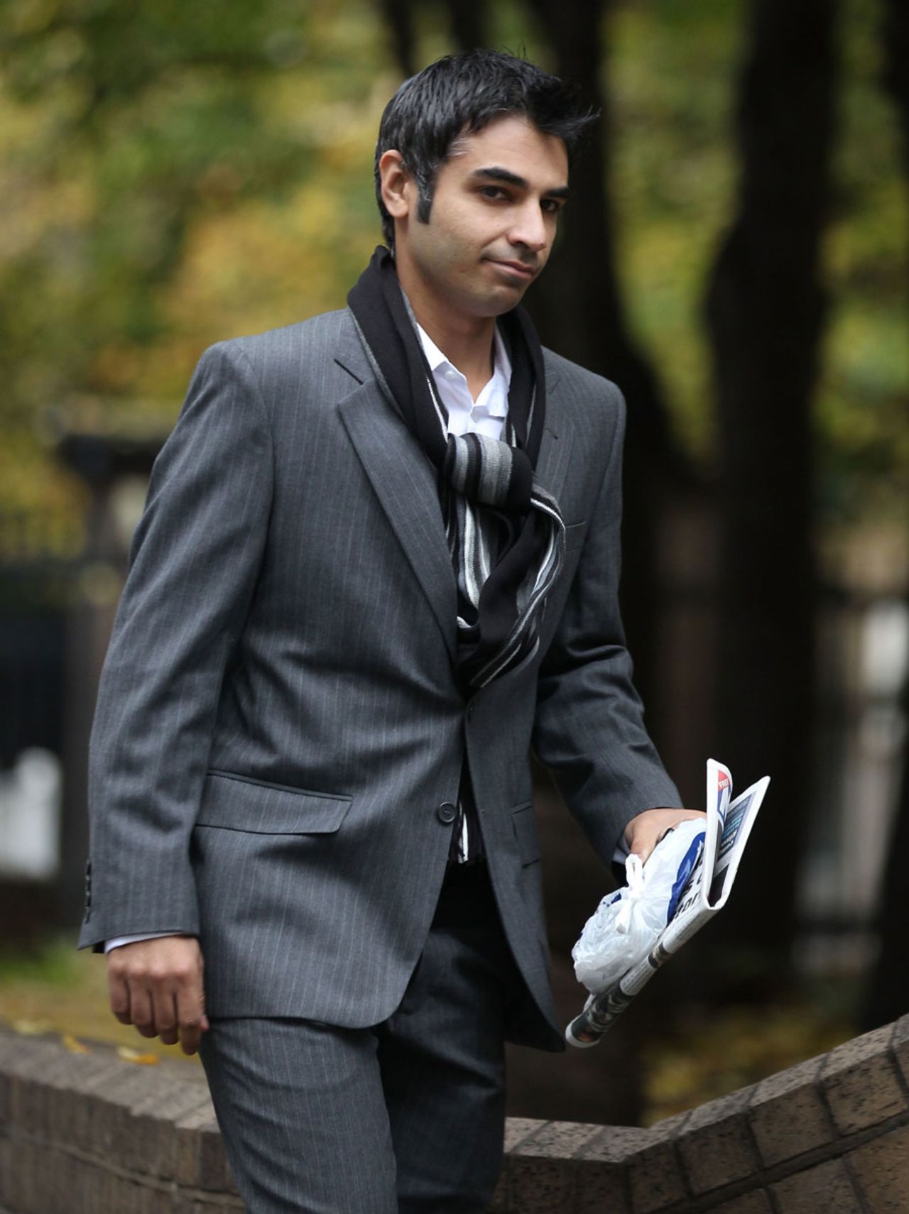 Salman Butt makes his way to the Southwark Crown Court, London, October 31, 2011