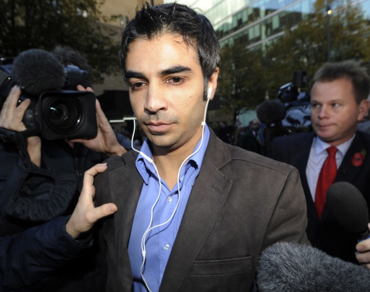 Salman Butt leaves Southwark Crown Court after being found guilty of cheating and accepting corrupt payments, London, November 1, 2011