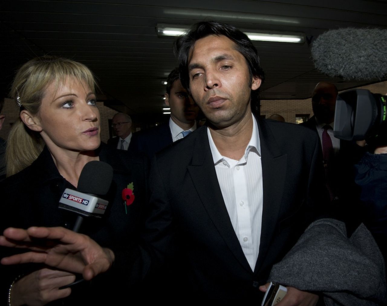 Mohammad Asif leaves Southwark Crown Court after being found guilty of cheating and accepting corrupt payments, London, November 1, 2011