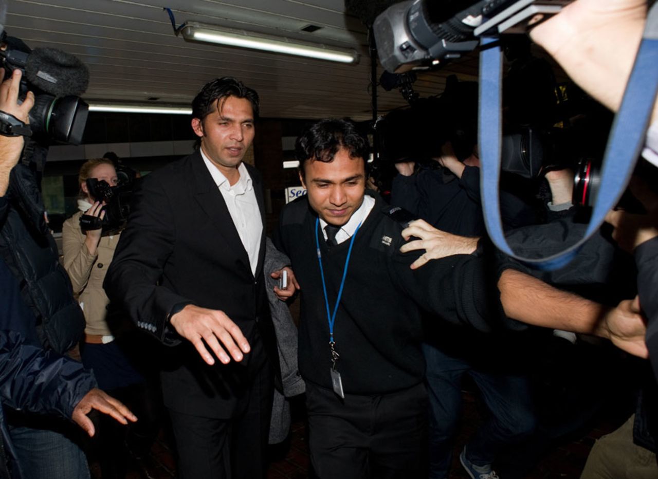 Mohammad Asif is escorted to Southwark Crown Court, London, November 3, 2011