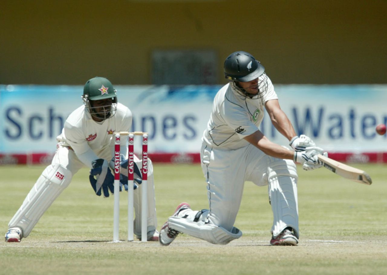 Ross Taylor swings over the leg side, Zimbabwe v New Zealand, only Test, Bulawayo, 4th day, November 4, 2011
