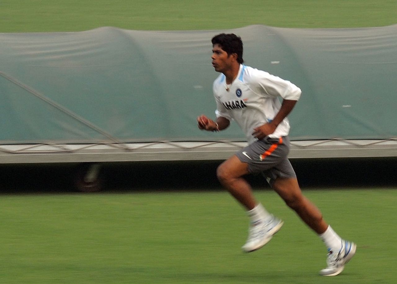 Umesh Yadav runs in during training, Delhi, November 4, 2011