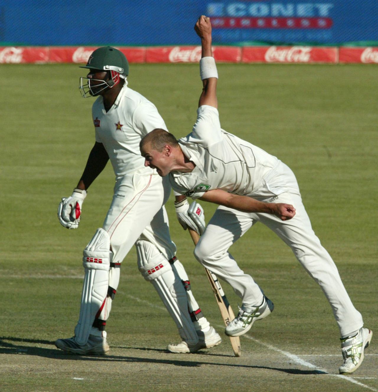 Chris Martin in his follow-through, Zimbabwe v New Zealand, only Test, Bulawayo, 4th day, November 4, 2011