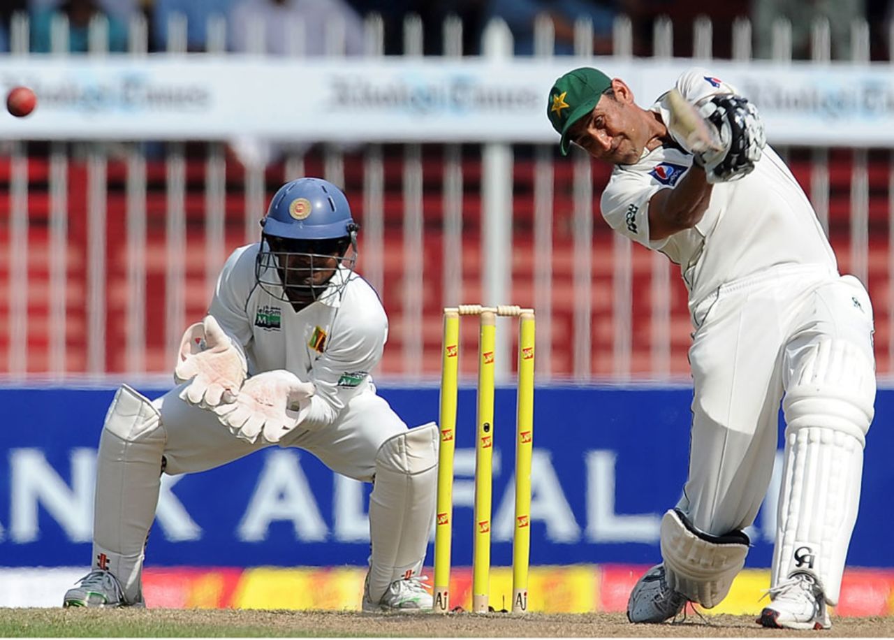 Younis Khan strains with the effort as he powers the ball over the off side, Pakistan v Sri Lanka, 3rd Test, Sharjah, 3rd day, November 5, 2011