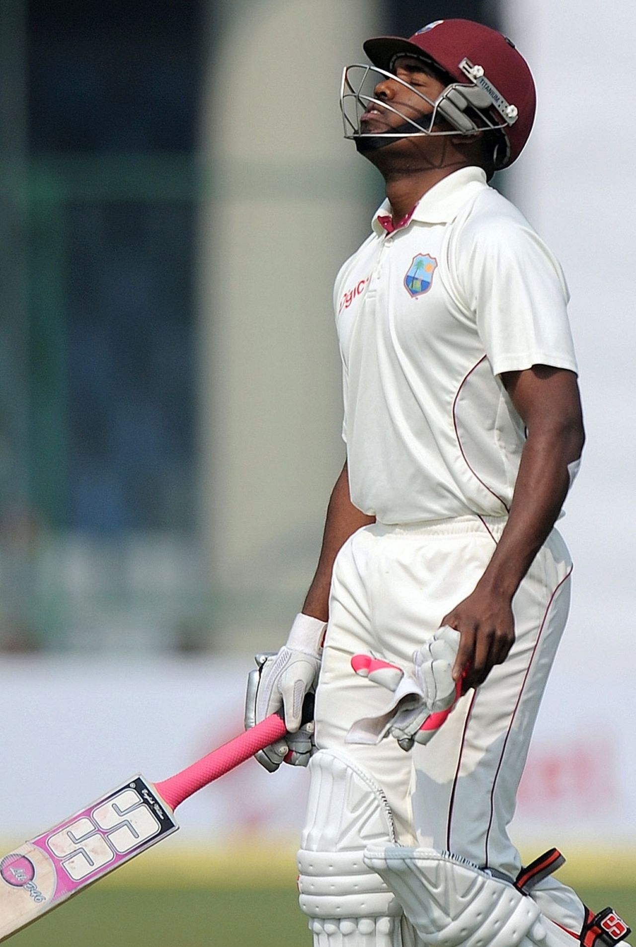 A dejected Darren Bravo walks back for 12, India v West Indies, 1st Test, New Delhi, 1st day, November 6, 2011