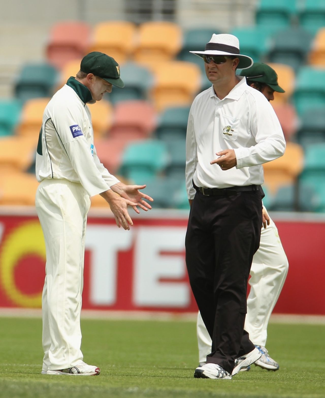 George Bailey debates with the umpire after an appeal against David Hussey was turned down, Tasmania v Victoria, Sheffield Shield, Day 3, Hobart, November 6 2011