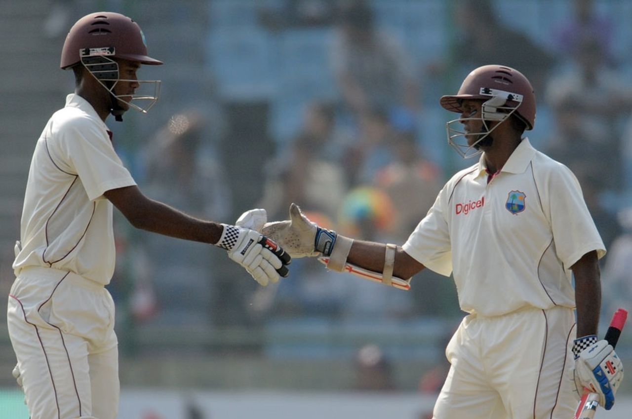 Kraigg Brathwaite congratulates Shivnarine Chanderpaul on reaching his fifty, India v West Indies, 1st Test, New Delhi, 1st day, November 6, 2011