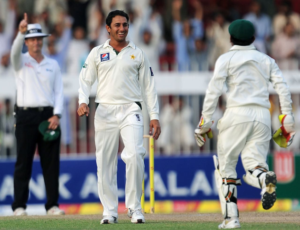 Saeed Ajmal celebrates his dismissal of Kaushal Silva, Pakistan v Sri Lanka, 3rd Test, Sharjah, 4th day, November 6, 2011 