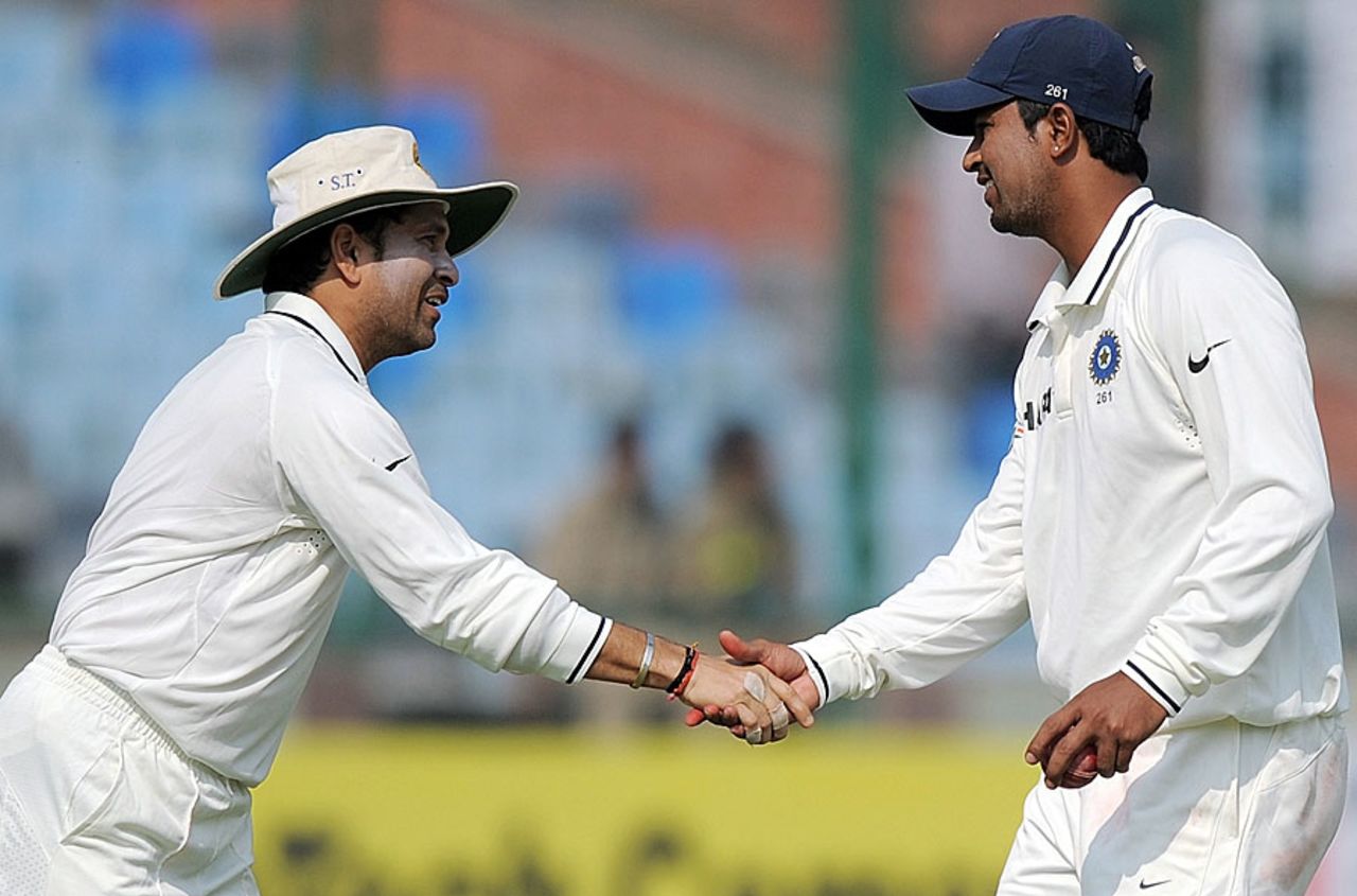 Sachin Tendulkar congratulates Pragyan Ojha for his five-wicket haul, India v West Indies, 1st Test, New Delhi, 2nd day