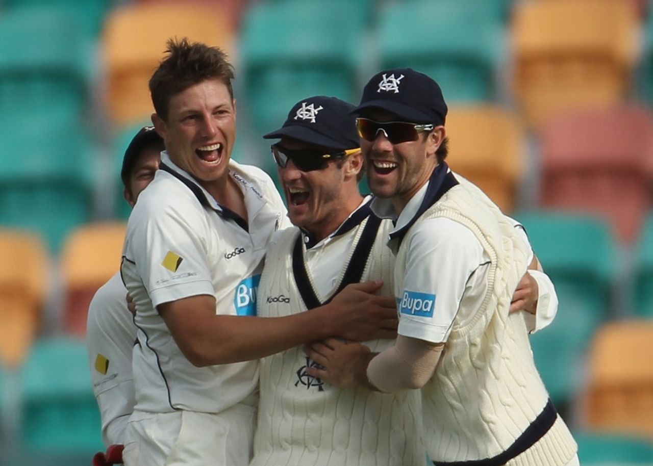 James Pattinson, David Hussey and Glenn Maxwell celebrate another wicket, Tasmania v Victoria, Sheffield Shield, day 4, Hobart, Nov 7 2011