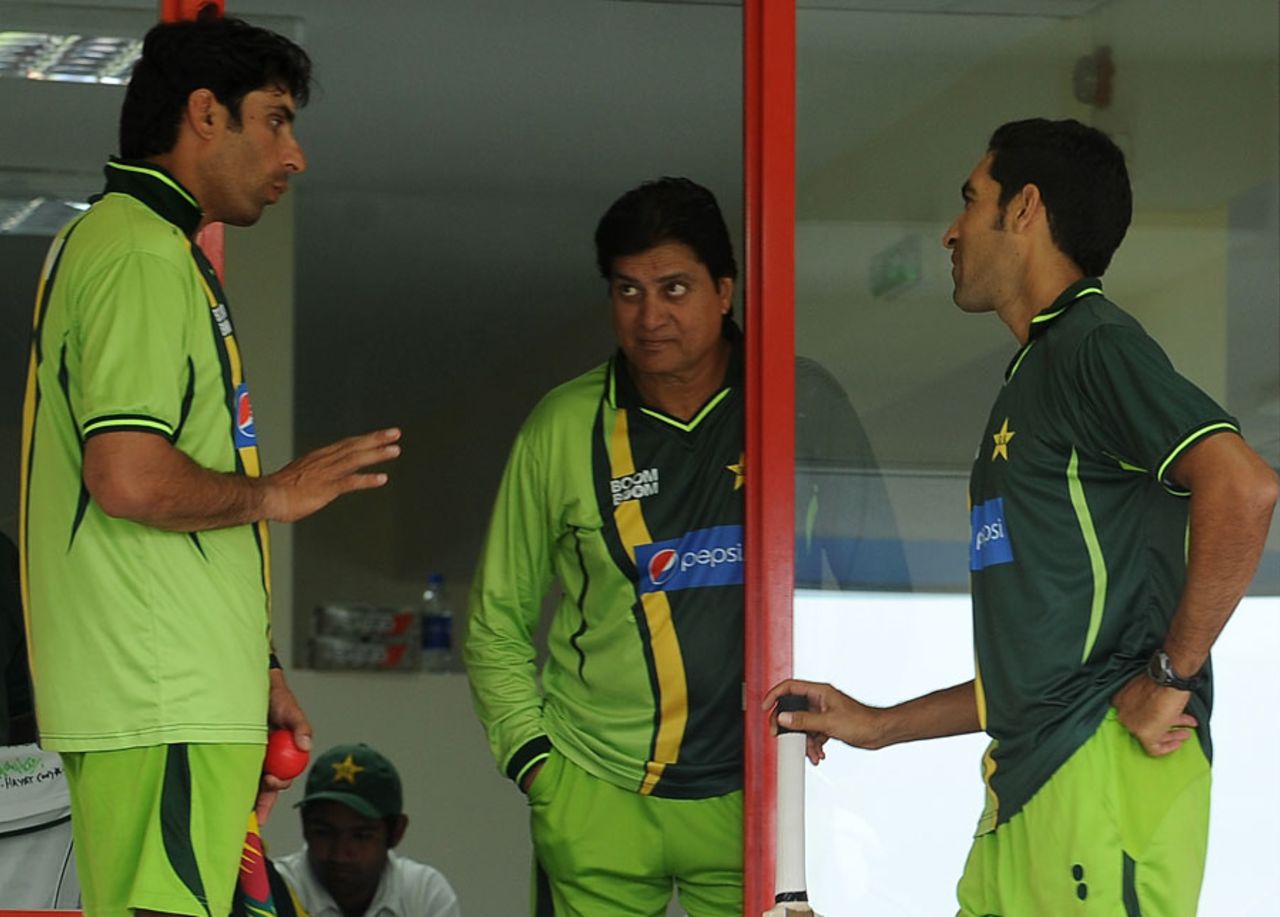 Misbah-ul-Haq, Mohsin Khan and Umar Gul talk while waiting for the rain to subside, Pakistan v Sri Lanka, 3rd Test, Sharjah, 5th day, November 7, 2011