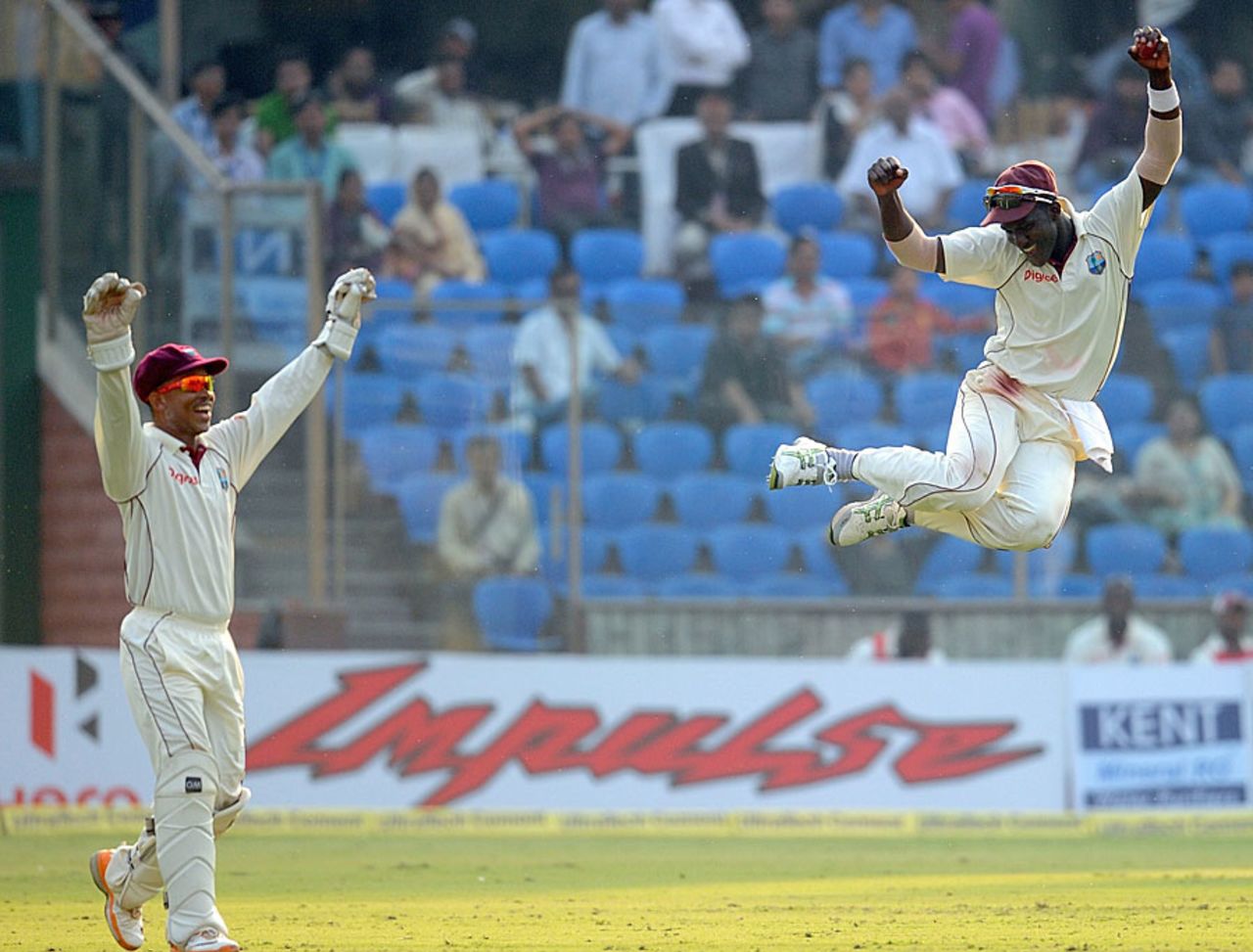 Darren Sammy shows off his other talents as another Indian wicket falls, India v West Indies, 1st Test, New Delhi, 2nd day, November 7, 2011
