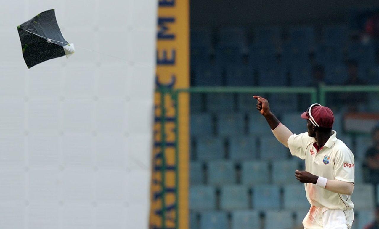 Darren Sammy flies a kite after the end of play, India v West Indies, 1st Test, New Delhi, 3rd day, November 8, 2011