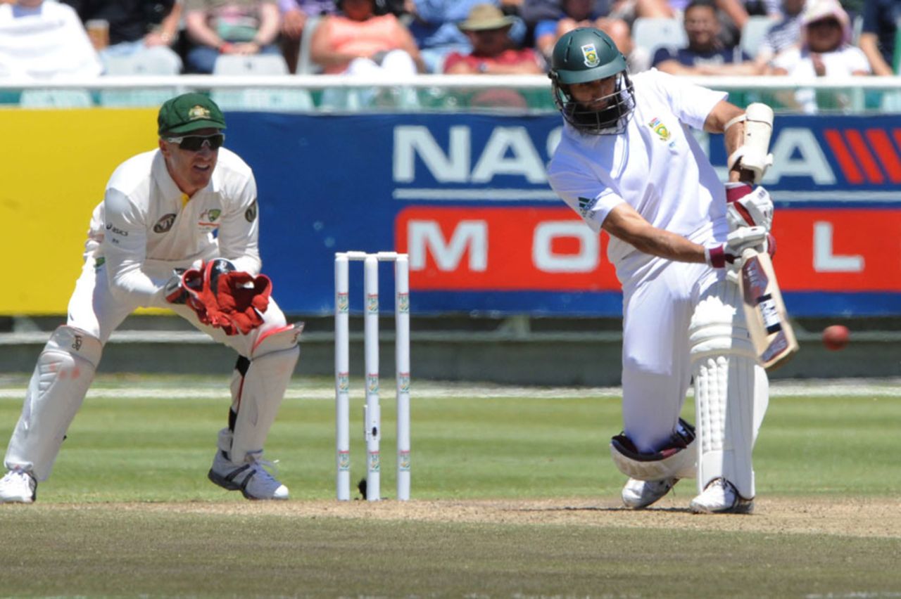 Hashim Amla comes down the track to play one to the leg side, South Africa v Australia, 1st Test, Cape Town, 3rd day, November 11, 2011